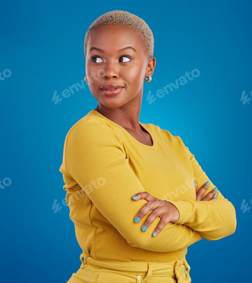 Preview: Proud profile of a black woman isolated on a blue background with confidence and creative mindset.
