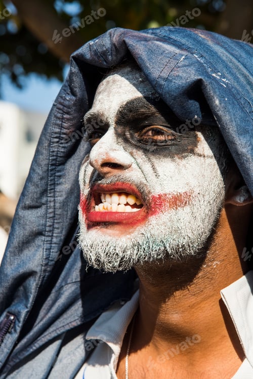 Preview: Close-up portrait of a horrible scary zombie man. Horror. Halloween.