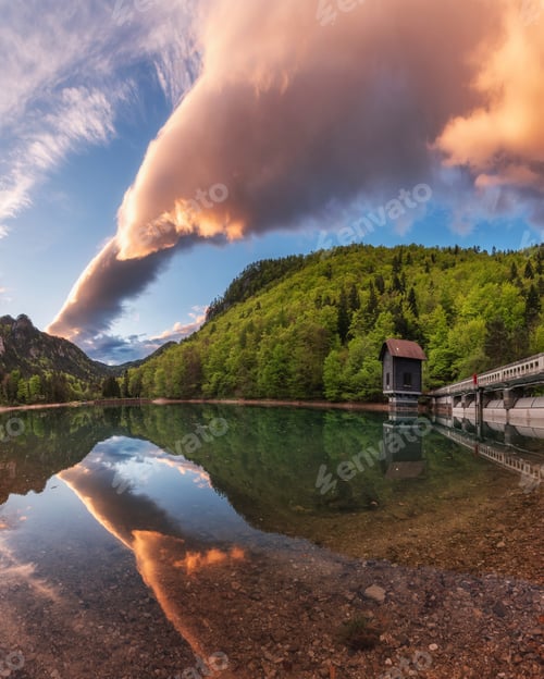 Preview: Vivid sunrise by the lake in the hills