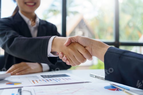 Preview: Business people handshake to make a contract business agreement to start a new business