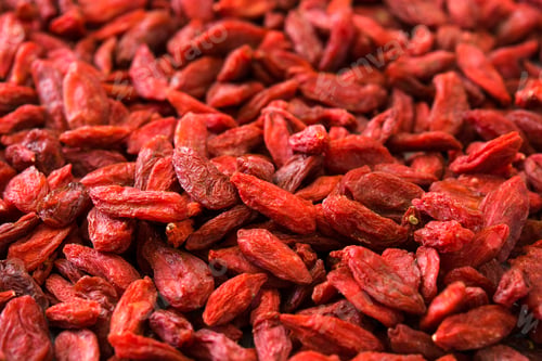 Preview: Dried goji berries forming a vibrant red background texture
