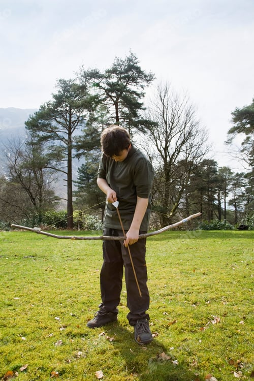 Preview: Boy with bow & arrow