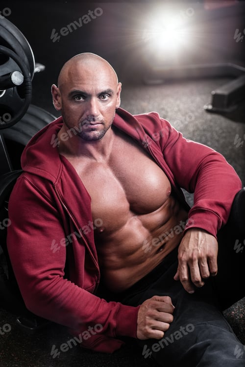 Preview: Bodybuilder is resting after the training