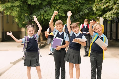 Preview: Little children in stylish school uniform outdoors