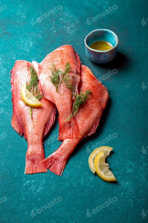 Preview: Fresh red sea bass on blue background