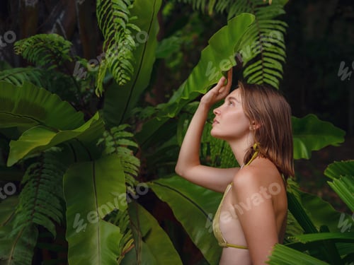 Preview: Portrait of a beautiful woman in tropical jungle