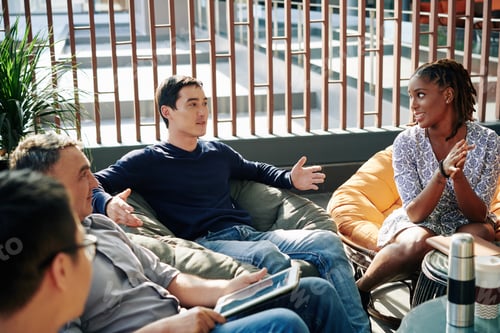 Preview: Businessman enjoying break with colleagues