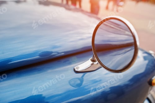 Preview: Side mirror of blue retro vintage car