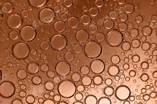 Preview: abstract light Peach Fuzz background with oil circles . bubbles of water close up