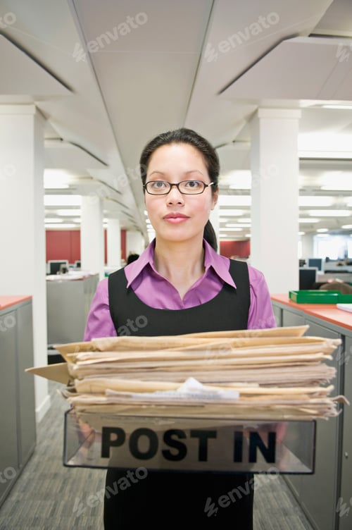 Preview: Business woman holding a 'post in' tray