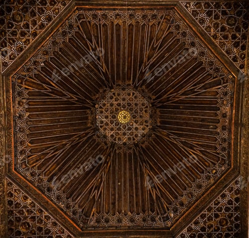Preview: Low angle shot of the ceiling of a cathedral with a beautiful ancient design in Seville, Spain