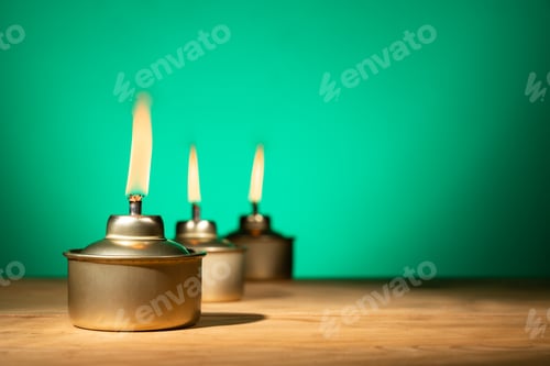 Preview: Pelita or oil lamp, traditional Malay oil lamp lit up during Ramadan and Hari Raya Aidilfitri Muslim