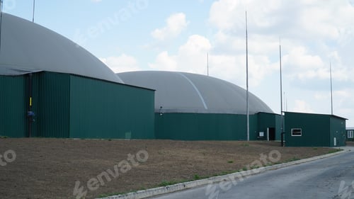 Preview: Biogas. Modern bio comlex. Renewable energy from biomass. Innovative biogas plant among green nature