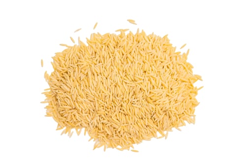 Preview: Pile of Uncooked Orzo pasta, raw dry Italian risoni isolated on white background. top view