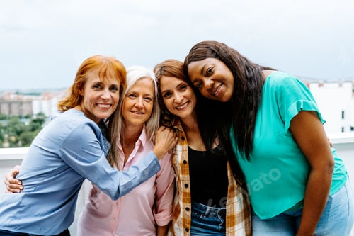 Preview: Group of Friends Enjoying a Festive Home Gathering with Wine and Food