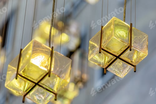 Preview: Colorful glass decoration, many lamps hanging from the ceiling, closeup
