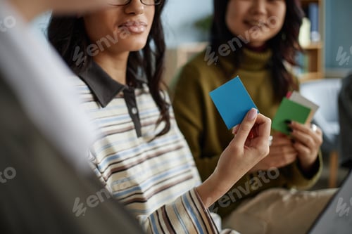 Preview: Multiethnic Teenagers Participating in Counseling Session and Holding Cards