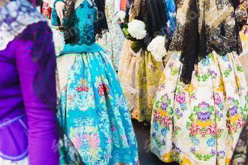 Preview: Traditional Spanish Valencian Fallera dress, colorful fabrics with intricate embroidery.