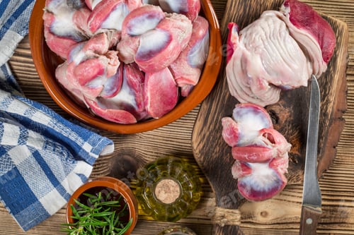 Preview: Raw uncooked turkey gizzards.