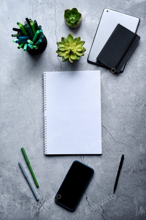 Preview: Notebook tablet and mobile phone on a table