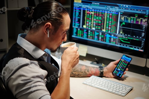 Preview: Trader monitoring open positions