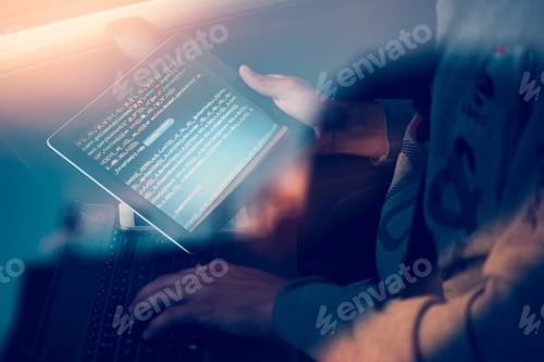 Preview: Hacker using computer, smartphone and coding to steal password and private data remotely from car