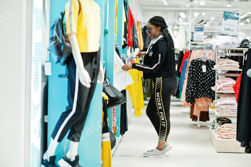 Preview: African woman shopping day.