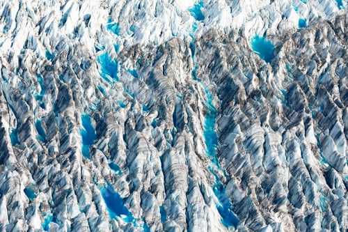 Preview: Deep fissures glacier surface blue meltwater pools