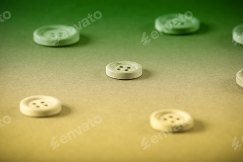Preview: Wooden Buttons Lie On A Bright Background