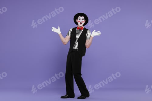 Preview: Mime artist making shocked face on purple background