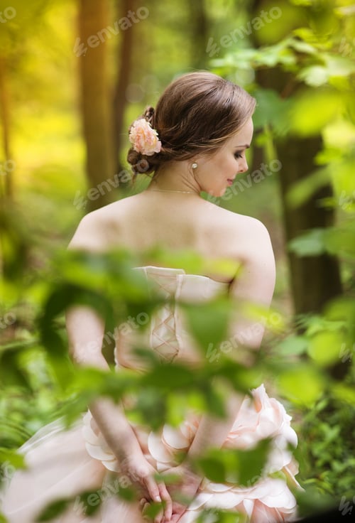 Preview: Beautiful bride in forest