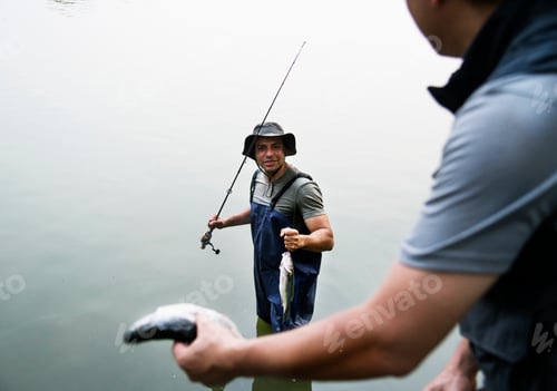 Preview: Men fishing at the lake