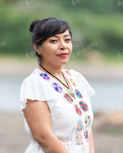 Preview: Expressive Portrait of a Beautiful Hispanic Woman in Embroidered Dress
