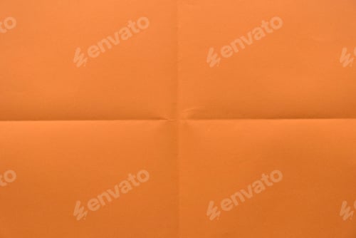 Preview: Folded orange color paper for background.
