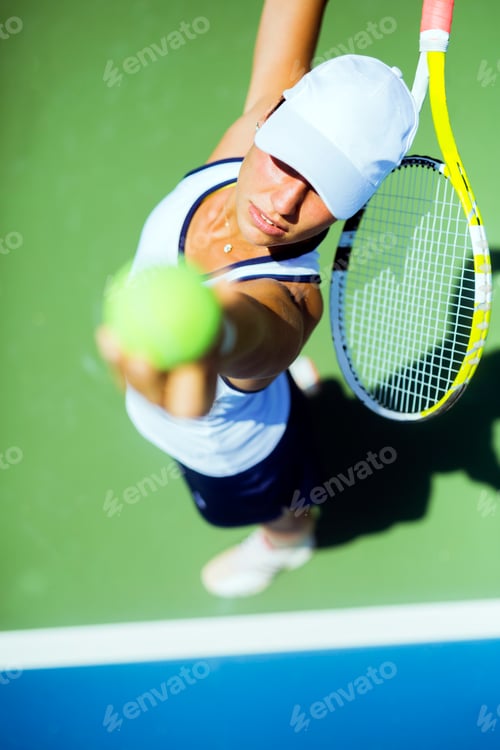 Preview: Beautiful female tennis player serving