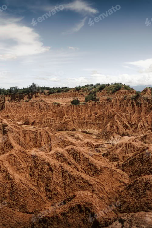 Preview: Vertical shot of a scenic view of The Tatacoa Desert or Valley of Sorrows in Huila, Colombia
