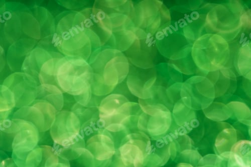 Visualização: Padrões embaçados circulares contra fundo verde