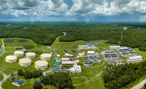 Preview: Aerial view of modern water cleaning facility at urban wastewater treatment plant.