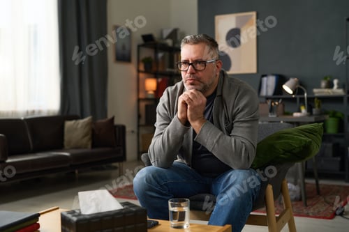 Preview: Reflecting in Living Room with Contemplative Expression