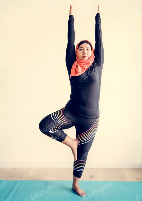 Preview: Islamic woman doing yoga in the room