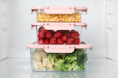 Preview: Boxes with different products inside of refrigerator