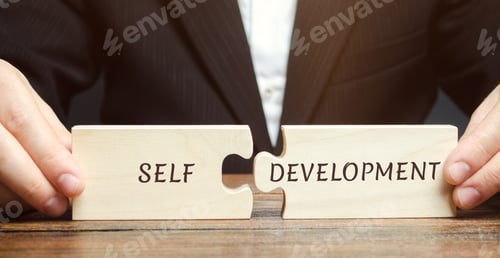 Preview: Businessman collects puzzles with the word Self-development