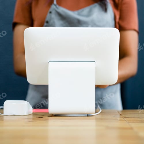 Preview: Small business owner at a cash register