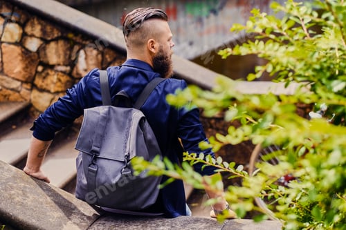 Preview: Traveler male with a backpack.