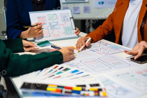 Preview: UX developer and ui designer brainstorming about mobile app interface wireframe design