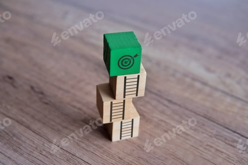 Preview: Wooden block staircase with uneven steps leading up to a target board.