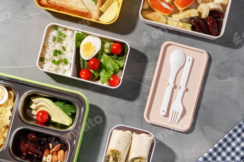 Preview: Containers with healthy food on gray background top view.