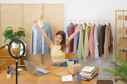 Preview: Online merchant concept, Successful fashion designer delightful with live streaming sales clothes
