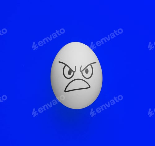 Preview: the evil scary angry face emotion painted on the easter egg, halloween concept