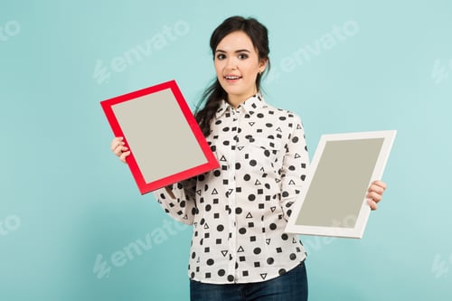 Preview: Young woman with two blank frames